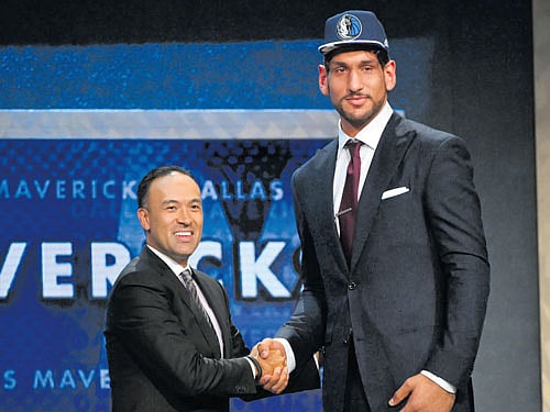 Satnam Singh with NBA Chief Operating Officer Mark Tatum.