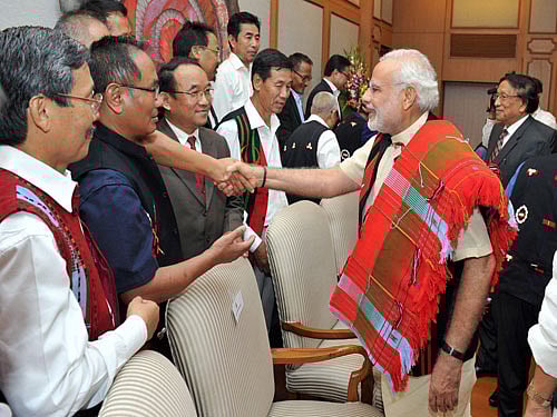 Prime Minister Narendra Modi meets NSCN leaders at the signing ceremony of historic peace accord between Government of India & NSCN, in New Delhi on Monday. PTI Photo