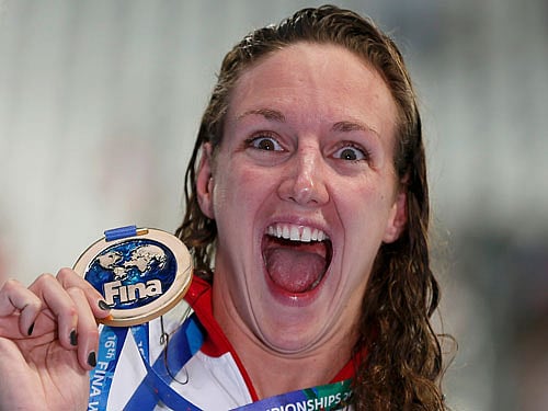 Hosszu of Hungary displays her gold medal after winning the women's 200m individual medley final at the Aquatics World Championships in Kazan. Reuters Photo