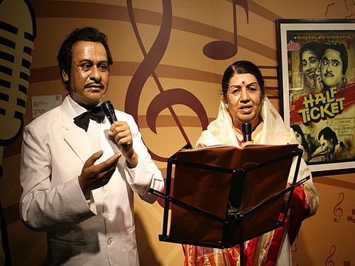 Kishore Kumar and Melody queen Lata Mangeshkar. PTI File Photo.