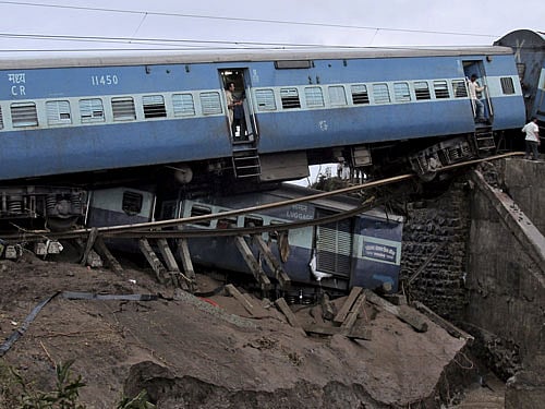 Damaged coaches of passenger trains are pictured after they derailed near Harda in Madhya Pradesh. Reuters Photo