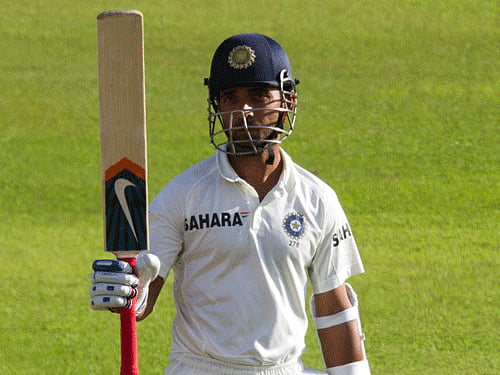 India's Rahane celebrates scoring a half century during the second day of the second cricket test match against South Africa in Durban. Reuters Photo