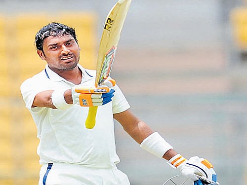 FINE KNOCK Shalabh Srivastava of Vidarbha celebrates after scoring a ton against KSCA XI on Saturday. DH PHOTO