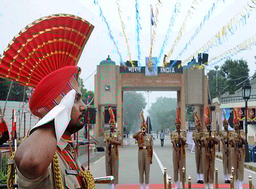 BSF personnel celebrating Independence day at Attari on Saturday. PTI Photo