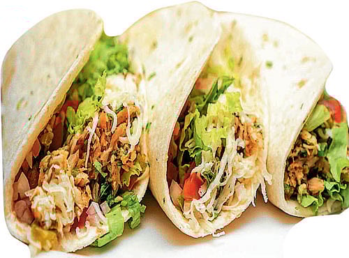 DELIGHTFUL Soft shell fish tacos with cucumber relish.