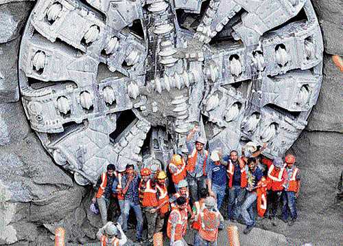 Namma Metro workers celebrate after tunnel boring machine  Krishna achieved a breakthrough at the Chickpet underground station on Monday. Dh photo