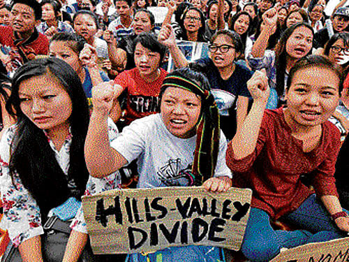 Students shout slogans during a protest against recent violence in Manipur, at Jantar Mantar in New Delhi on Wednesday. PTI