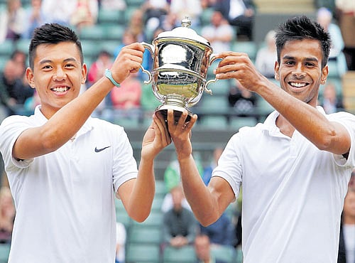 ONE FOR THE ALBUM The Wimbledon Boys' doubles title, partnering Nam Hoang Ly (left) of Vietnam, has been Sumit Nagal's biggest success so far in his brief career. The Delhi boy is keen to break into top-300 in the men's game by early next year.