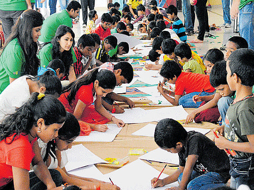 COLOURFUL WORLD The painting competition in progress.