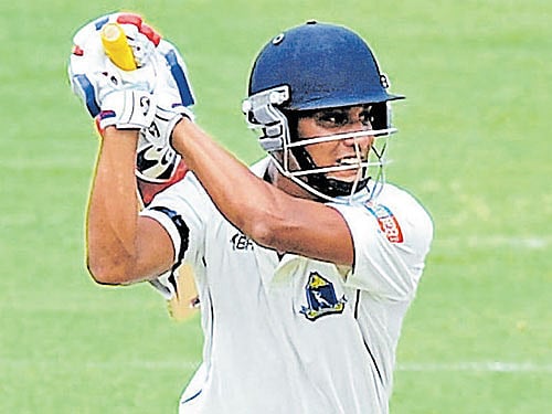 Sudip Chatterjee drives en route to his century on Thursday. DH PHOTO/ SRIKANTA SHARMA R