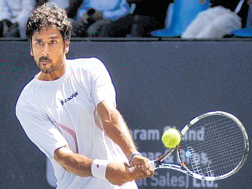 hard-fought win India's Saketh Myneni essays a backhand return during his quarterfinal win over Belgium's Yannick Mertens in Bengaluru on Friday. DH photo/ kishor kumar bolar