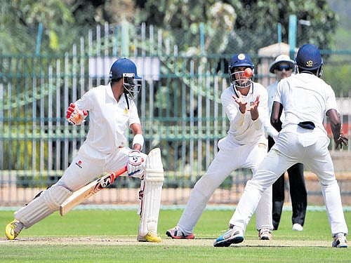 easy one: Haryana's Himanshu Rana is about to take R Samarth's offer off Jayanth Yadav on Sunday. dh photo/ prashanth hg