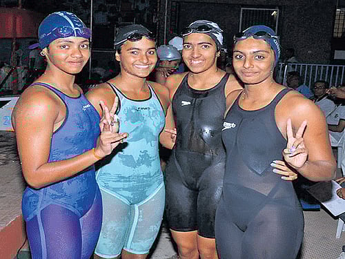 all smiles: The victorious Karnataka 4x200M relay squad on Saturday. From left: Preksha HM, Damini K Gowda, Malavika V and Shraddha Sudhir.