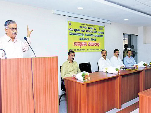 SBI assistant general manager R N Kulkarni speaks during the inauguration of the pollution control month at the RTO in Mangaluru on Tuesday. DH photo