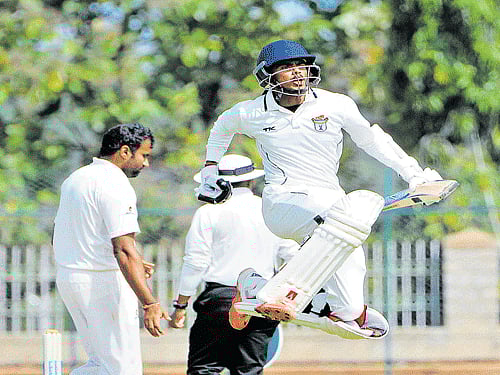 leap of joy: Odisha's Govinda Poddar celebrates after scoring a century against Karnataka on the opening day of their Ranji Trophy game on Saturday. dh photo/ prashanth hg