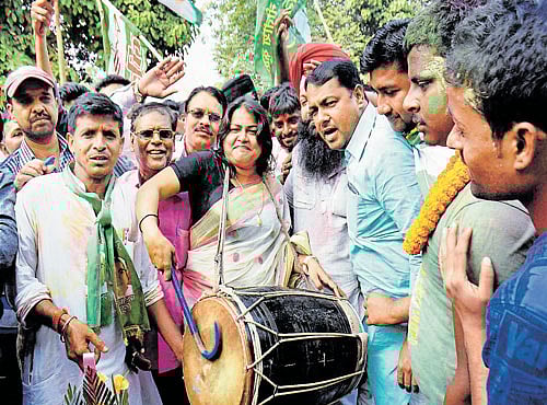 CELEBRATION TIME: JD(U) supporters celebrate the Grand Alliance's victory in Bihar Assembly elections at the party office in Patna on Sunday. PTI