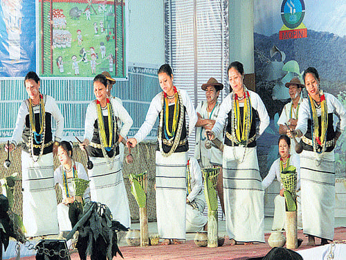 festivity Popir dance is a celebratory feature of Mopin festival. Photo by author