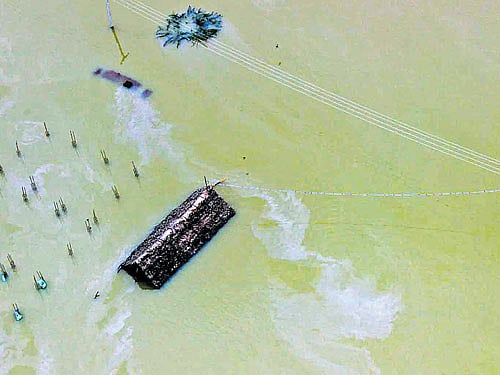 A view of the flooded Chennai suburbs on Monday. DH Photo