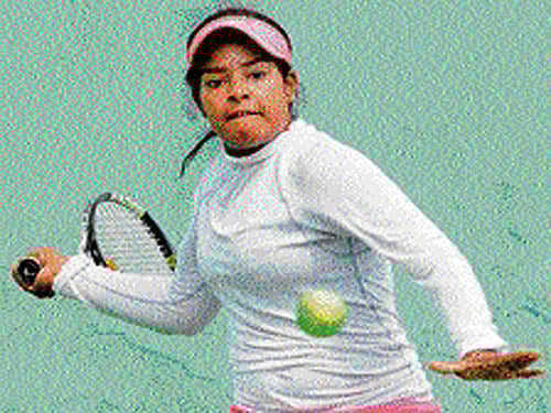 Snehadevi Reddy in action during her first round match against Preethi Ujjini. DH PHOTO/Krishna Kumar