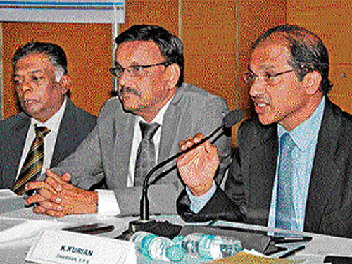 UPASI head N Dharmaraj (left) and KPA President K Kurian. DH Photo