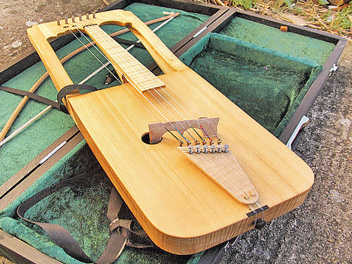 tales of tune Crwth; (right) hardingfele.