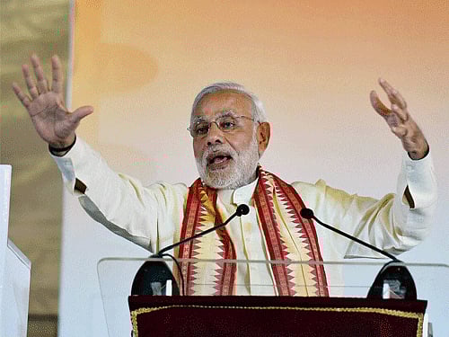 Prime Minister Narendra Modi addressing after unveiling the Swami Vivekananda statue at Ramakrishna Mission, in Kuala Lumpur, Malaysia on Sunday. PTI Photo.