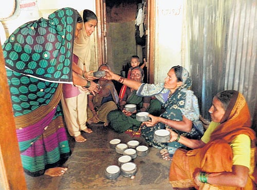 FOUND NO WHERE ELSE Women of Kolhar village making and selling the famous curd.