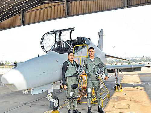 proud moment: Air Marshal Kulwant Singh Gill with his son Flying Officer Shahbeg Gill, after flying a three-aircraft close formation sortie on a Hawk Mk132 at the Bidar Air Force station on Saturday. DH PHOTO