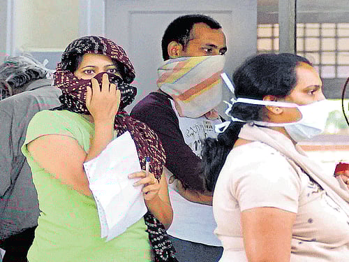 People wait for Swine flu checkup outside H1N1 flu ward at Rajiv Gandhi Institute of Chest Disease in Bengaluru.  DH FILE PHOTO