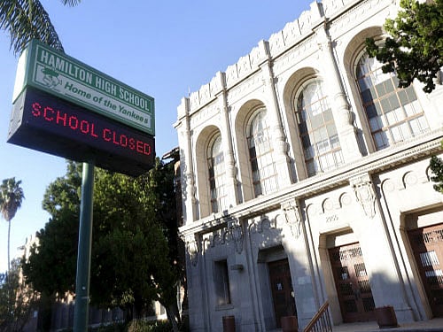 Authorities decided to close the entire school system after it received a 'credible threat' of violence involving backpacks and packages left at school campuses, officials said at a press conference today. Reuters photo