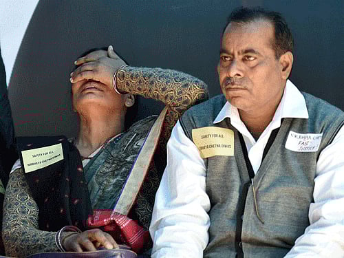 Narbhaya's parents Badrinath Singh and Asha Devi at a programme to observe the third anniversary of Nirbhaya gang-rape case as 'Nirbhaya Chetna Divas' at Jantar Mantar in New Delhi on Wednesday. PTI Photo.
