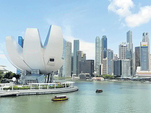 clean and complicated: A view of the city skyline in Singapore. Singapore topped among Asian cities in the Siemens Green City index, a compilation of cities lauded for using innovative methods to minimise their impact on the environment.
