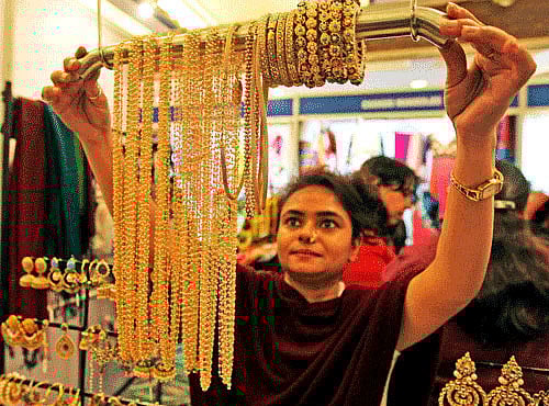 Gold in New York, which mostly determines the price trend in the Indian market, rose 0.96 per cent to $1,088.80 an ounce and silver gained 0.61 per cent to $13.91 an ounce on Friday's trade. PTI File Photo.