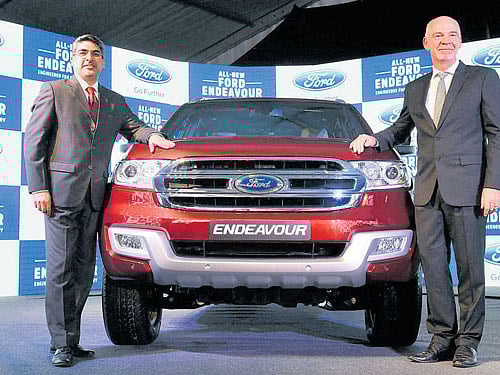 Ford India Executive Director for Marketing, Sales & Service Anurag Mehrotra (left) and Ford India Managing Director and President Nigel Harris unveil the new Ford Endeavour in Mumbai on Wednesday. PTI