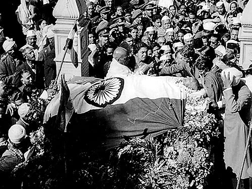 Moments after he was shot by Godse; his body lying in state at Birla House, with his chest left uncovered displaying the gunshot wounds; his last journey.   Photo courtesy: Anand kumar bhowmick & 'let's kill gandhi!' by tushar a gandhi