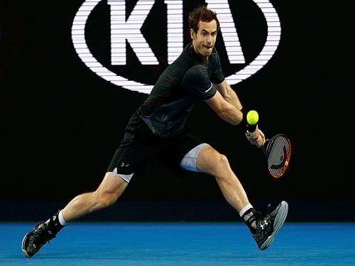 Britain's Murray hits a shot during his third round match against Portugal's Sousa at the Australian Open tennis tournament at Melbourne Park. Reuters Photo.