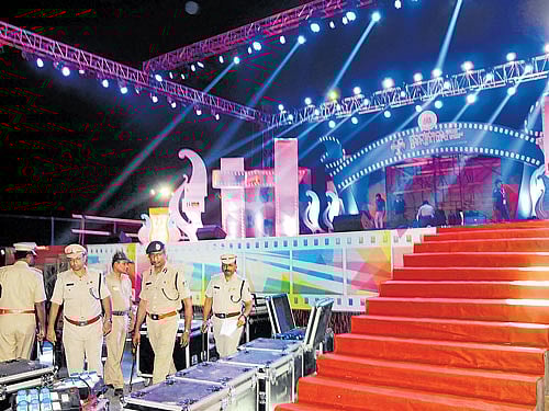All set Police inspect the stage set up in front of the Vidhana Soudha for the inauguration of Biffes in the City on Wednesday. DH photo