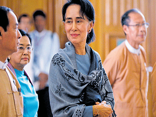 building bridges: National League for Democracy (NLD) party leader Aung San Suu Kyi arrives to attend Union Parliament in Naypyitaw. China has come to think of Suu Kyi as a consummate pragmatist, who has taken positions that are accommodating to China's interests. Reuters Photo.