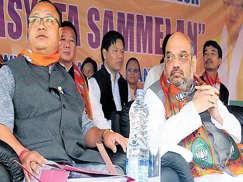 Arunachal Pradesh BJP state unit president Tai Tagak along with party's national president Amit Shah. DH File Photo