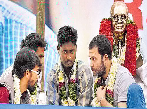 IN SOLIDARITY: Congress vice- president Rahul Gandhi with students at University of Hyderabad during a protest over Rohith Vemula's death on Saturday. PTI