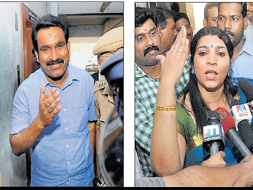Solar scam accused Biju Radhakrishnan and Saritha S Nair talk to reporters after they were subjected to face-to-face cross-examination at the Solar Commission office in Kochi on Saturday. PTI