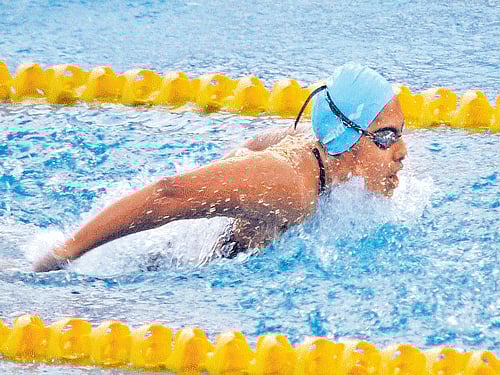 BIG SPLASH: India's Sayani Ghosh powers to the gold in the women's 400M individual medley in Guwahati on Sunday. PTI