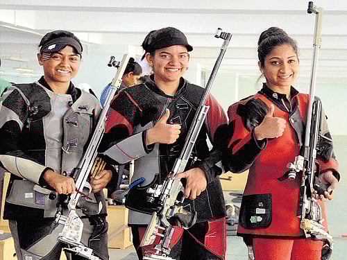 girls, guns and gold!: India's Anjum Moudgil (middle), Elizabeth Koshy (right) and Lajja Gauswami after the women's 50M rifle final at the 12th South Asian Games in Guwahati on Saturday. pti