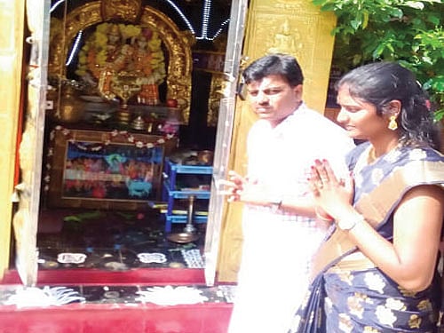 A young couple offers prayers at Valentine's Sri Krishna Temple in Vellore district of Tamil Nadu on Sunday