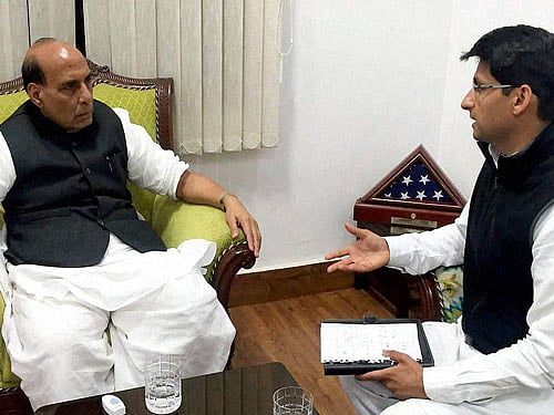 Home Minister Rajnath Singh during a meeting with Congress MP Deepender S Hooda, in New Delhi on Sunday. PTI Photo