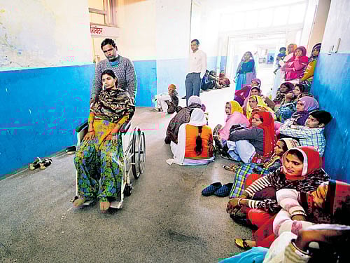 many takers: A patient is wheeled out of an operation room after sterilisation surgery at a government hospital in Mahendragarh. For decades, India has relied on female sterilisation as its primary mode of contraception, funding about 4 million tubal ligations every year. nyt