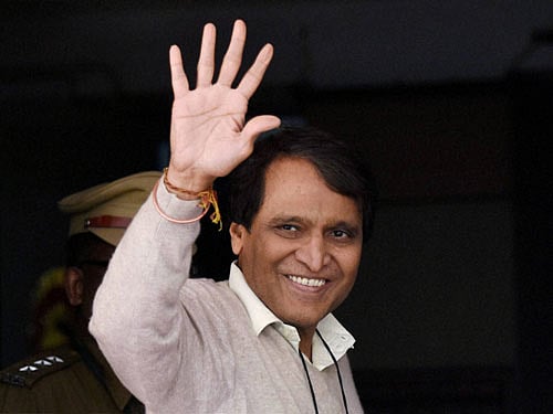 Union Minister of Railways Minister Suresh Prabhakar Prabhu arrives at Rail Bhavan in New Delhi on Thursday before presenting Railway Budget 2016-17 in Parliament. PTI Photo