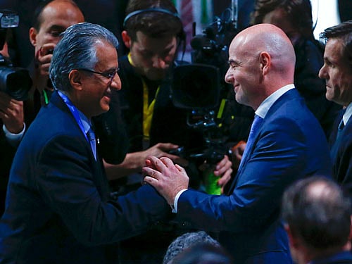 FIFA presidential candidate Sheikh Salman Bin Ebrahim Al-Khalifa of Bahrain congratulates newly elected FIFA President Infantino during the Extraordinary Congress in Zurich. Reuters Photo.