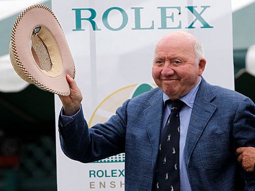 File photo of Tennis Hall of Fame member Collins  greets the crowd gathered for the Tennis Hall of Fame Induction Ceremony in Newport. Reuters