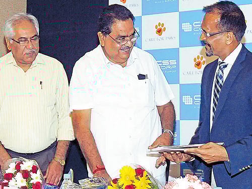 Principal Chief Conservator of Forests Vinay Luthra, Forest, Ecology and Environment Department Minister B Ramanath Rai and Forest, Ecology and Environment Department Additional Chief Secretary Mahendra Jain at the release of the scientific journal in Bengaluru on Wednesday. dh Photo